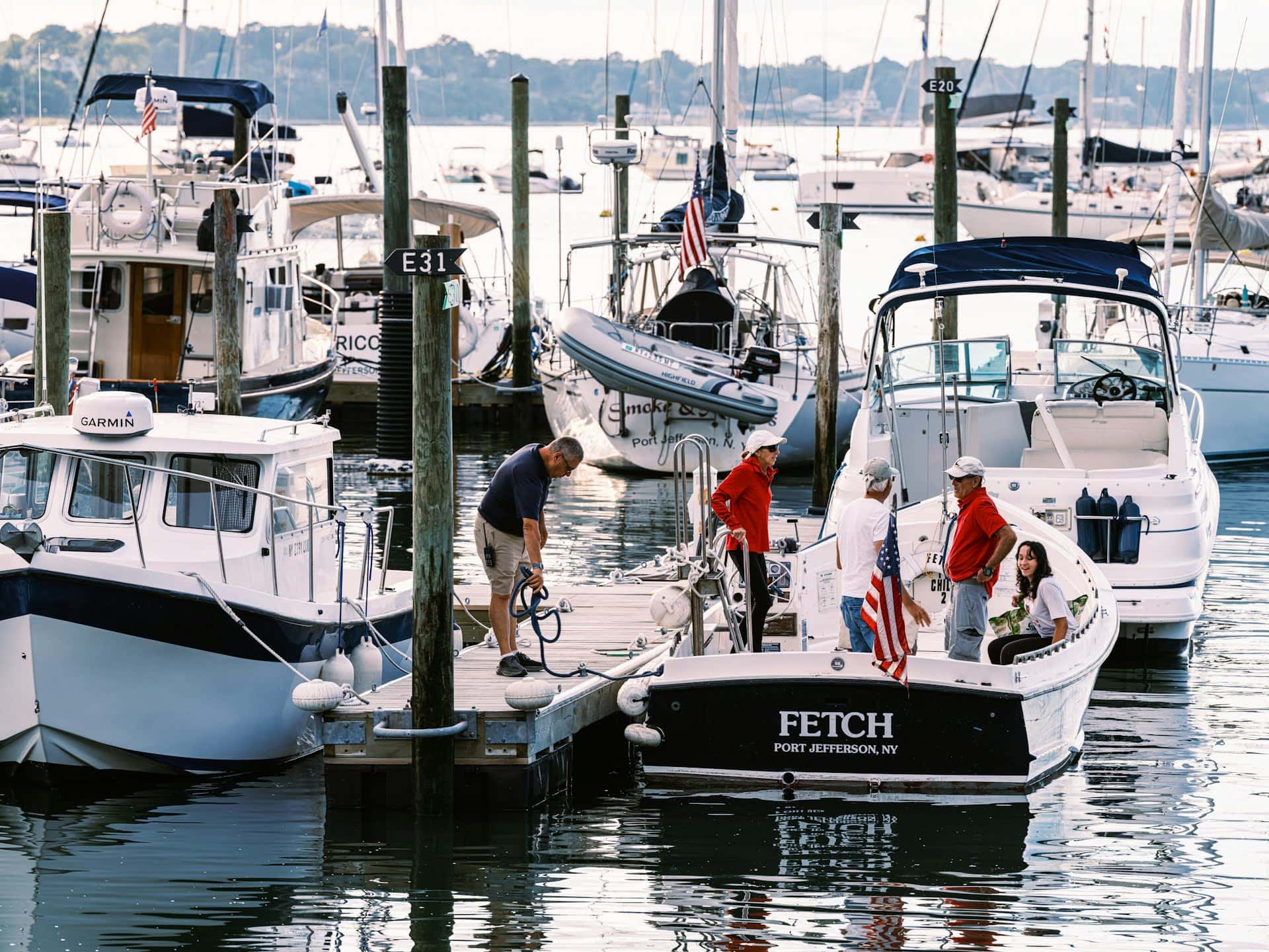 Boater using Atlantis Marina app during a dockside marina workflow