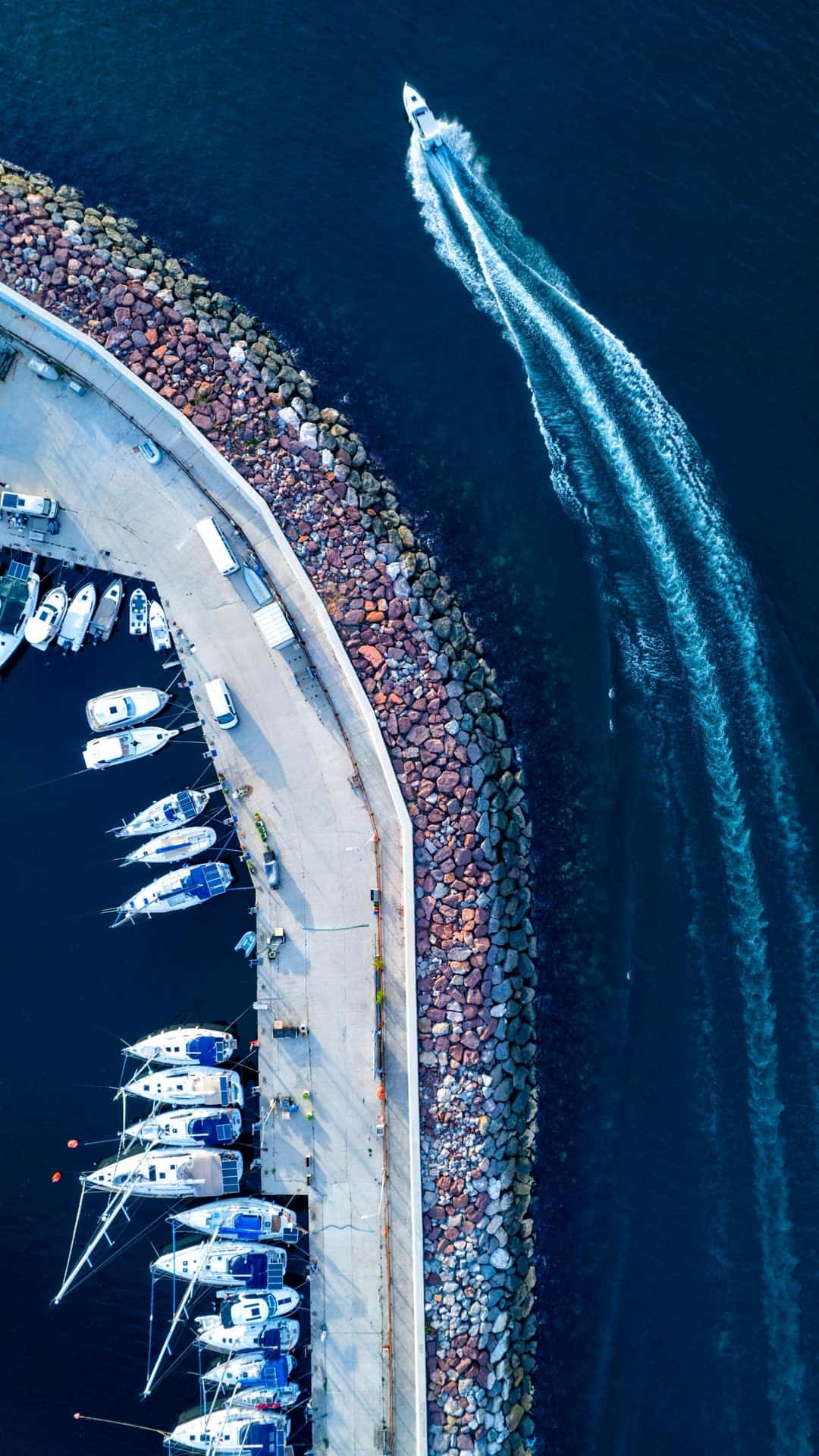 Aerial view of a marina used to illustrate Atlantis Marina pricing by facility size